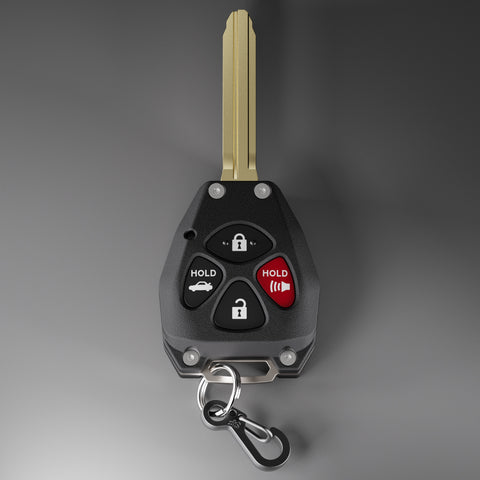 Front view of Toyota 4 button key fob shell replacement kit for Corolla, Camry, Avalon